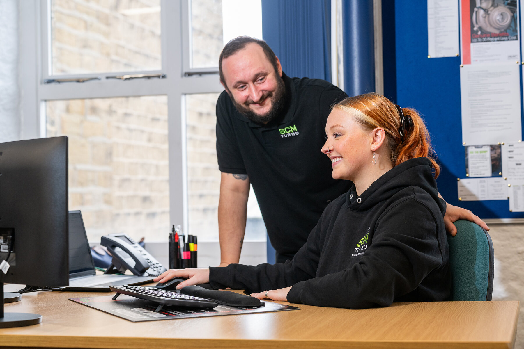 SCM Turbo team members working together